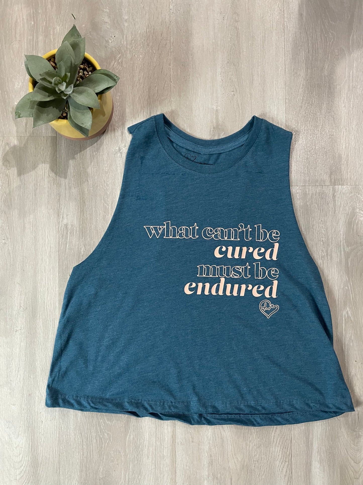 What Can't Be Cured Racerback Cropped Tank